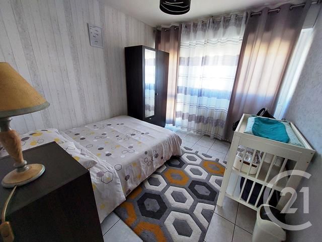 Afficher la photo en grand Appartement F4 à vendre - 4 pièces - 86.43 m2 - BOURG EN BRESSE - 01 - RHONE-ALPES - Century 21 Agence Immobilière Du Centre